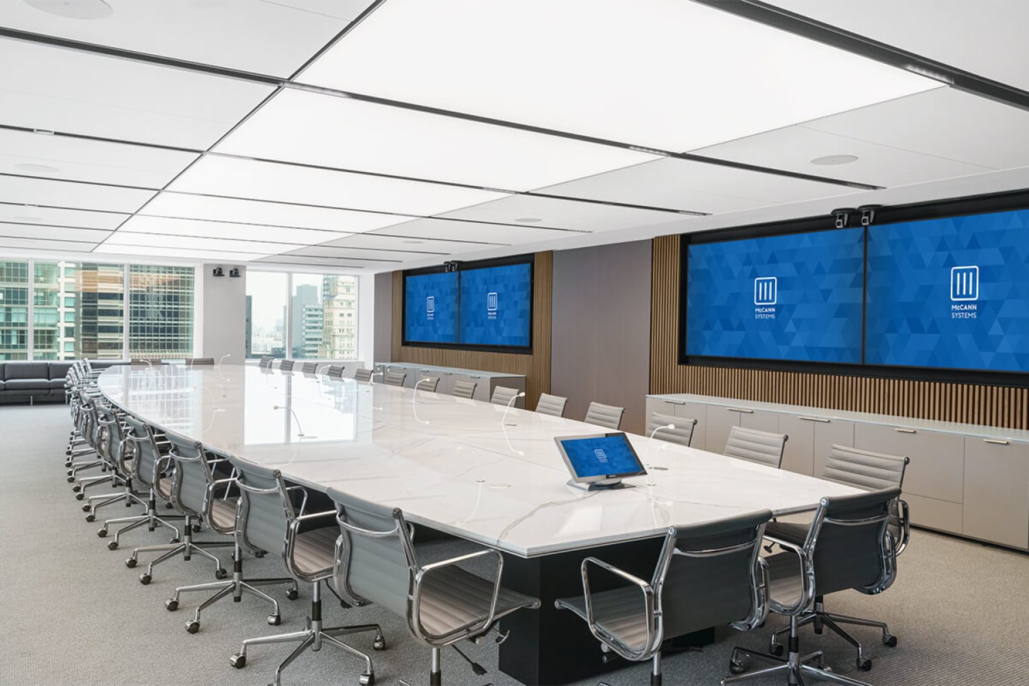 Large conference room with multiple screens. Source: https://mccannsystems.com/projects/park-avenue-plaza-boardroom-new-york-city/